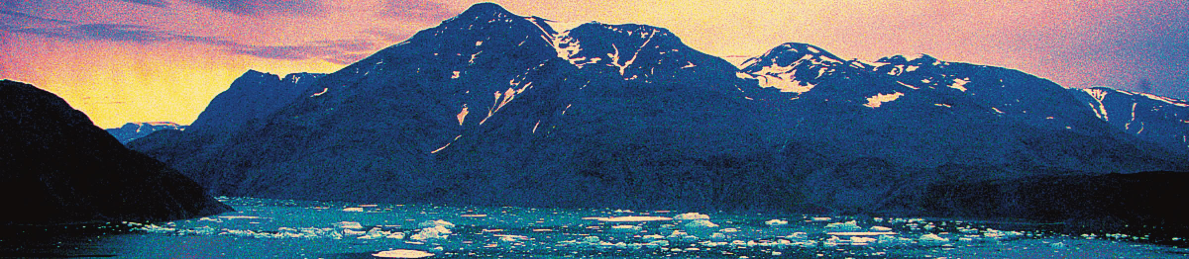 Sunset over western Greenland.  Photo © copyright Stephen Codrington, 1996.